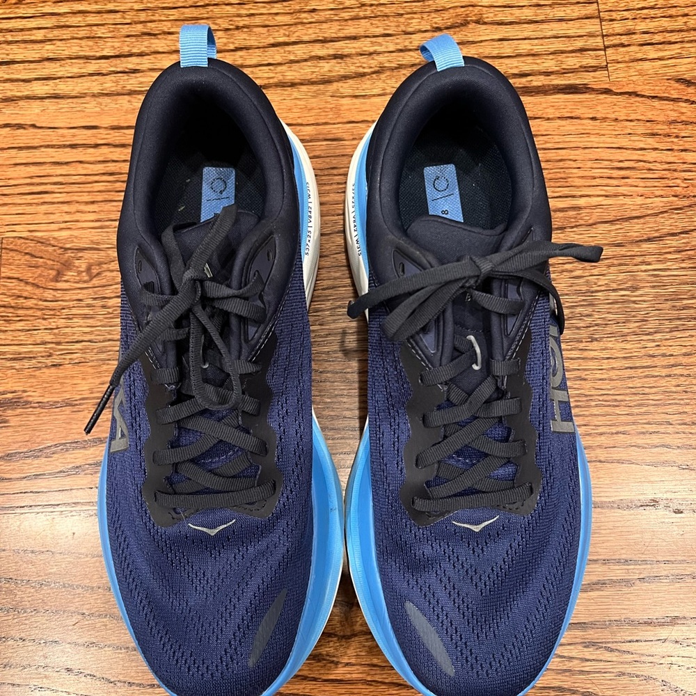 Gently used Hoka Blue Athletic Shoes with Breathable Mesh and Thick Sole